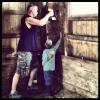 Jake and aaron working in the cattle barn